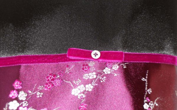 Handmade bag Chinese blossom detail close-up