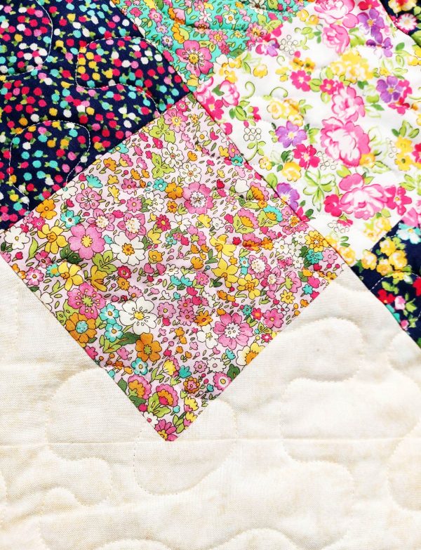 Handmade quilt Floral hopscotch design close-up front