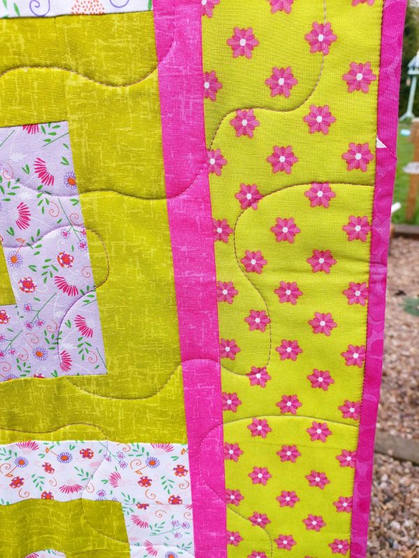 Handmade quilt In the frame design pattern close-up front