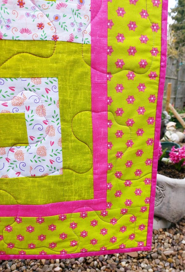 Handmade quilt In the frame design pattern close-up front