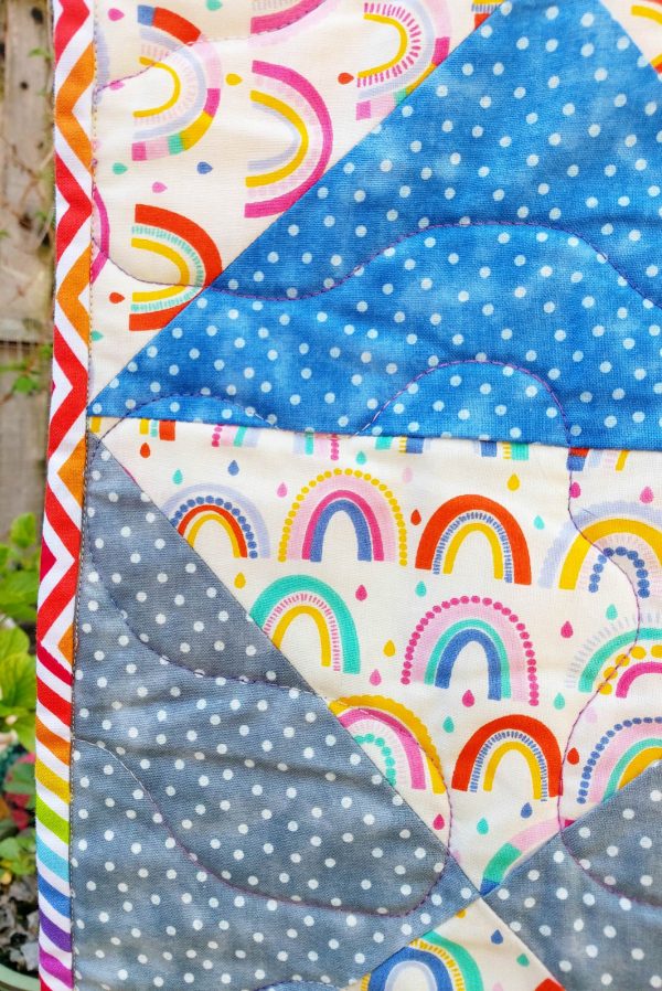Handmade quilt Rainbow drops design pattern close-up front