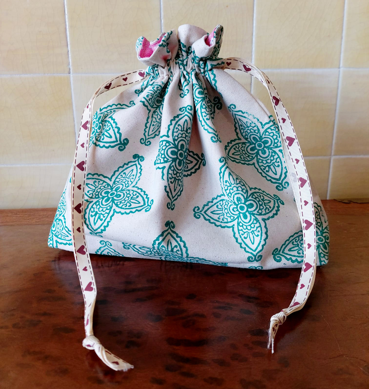 Handmade block-printed drawstring bag front closed